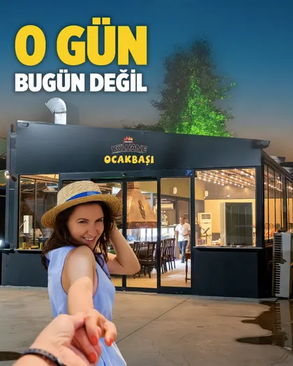 Külhane Ocakbaşı'nın akşamüstü dış görünümü ve aydınlatılmış girişi